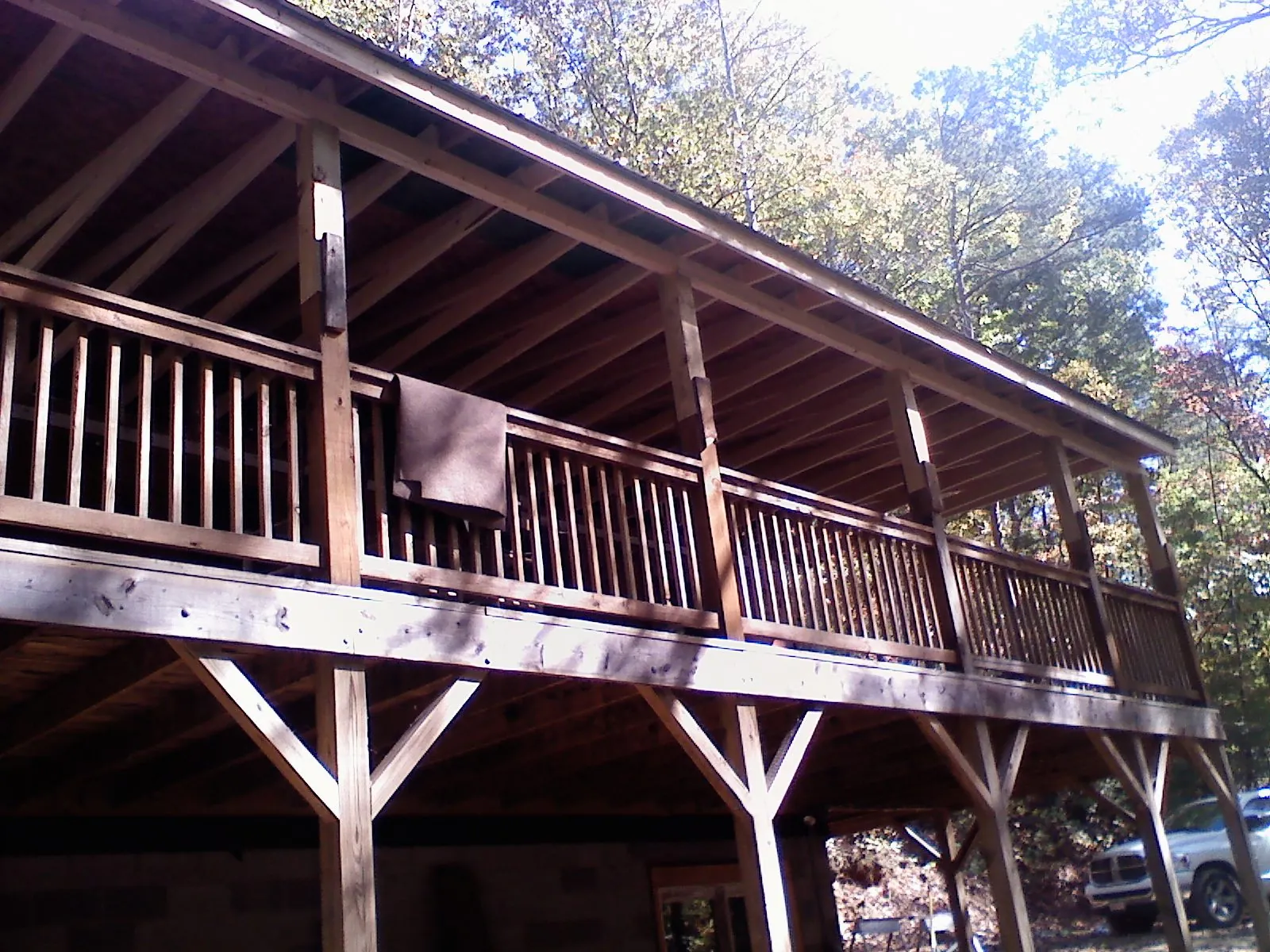 Timber framing under a new elevated porch and deck — Roof Leak Repair in Portola Valley by Roofing Brothers